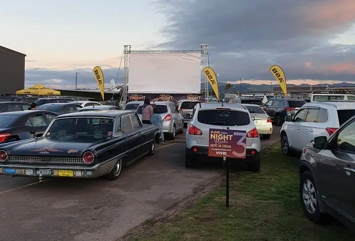 Classic cars parked waiting for outdoor cinema